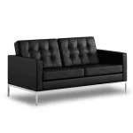 Sillon de 2 cuerpos, base en caño cuadrado cromado, almohadones tapizado en ecocuero negro
